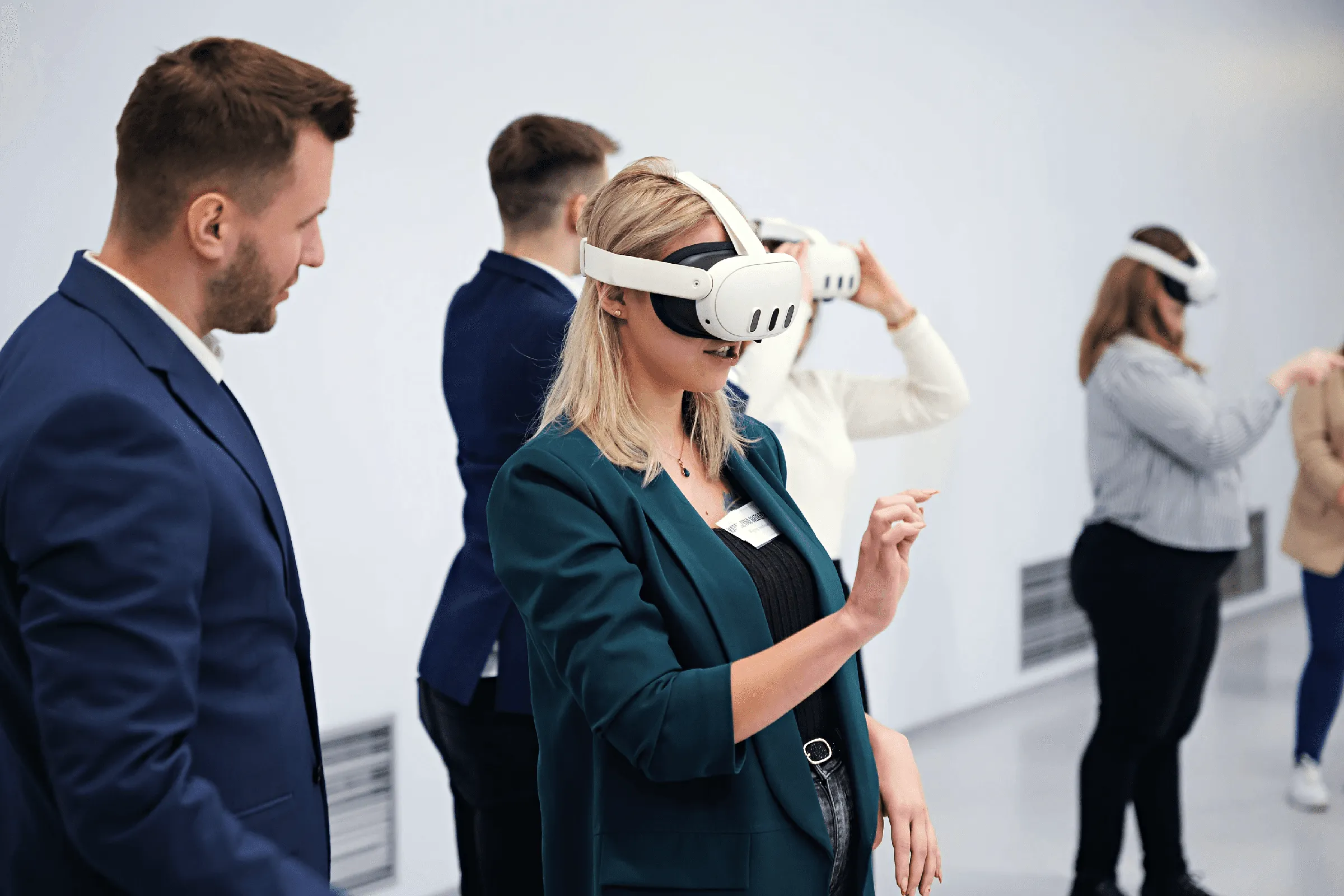 Business people trying VR headsets at an EHS VR demonstration