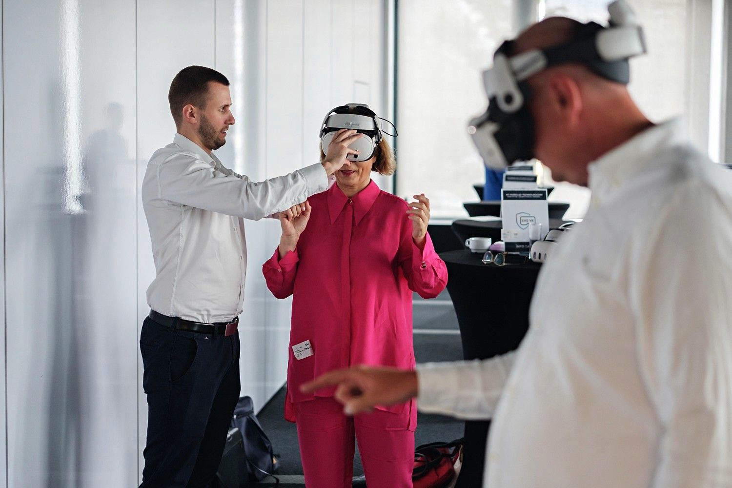An EHS VR specialist guiding a participant wearing a VR headset