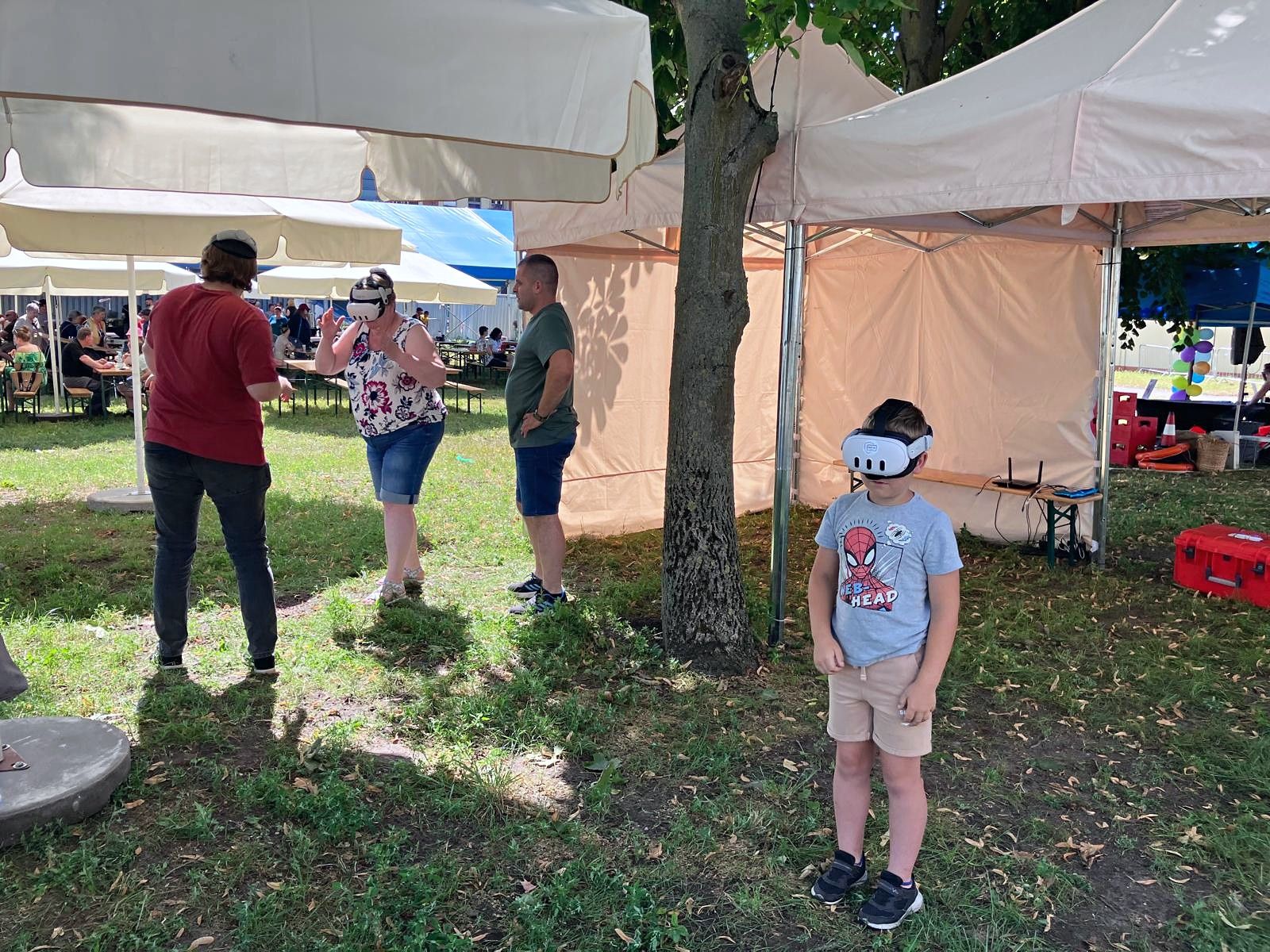 Children at a festival trying VR headsets