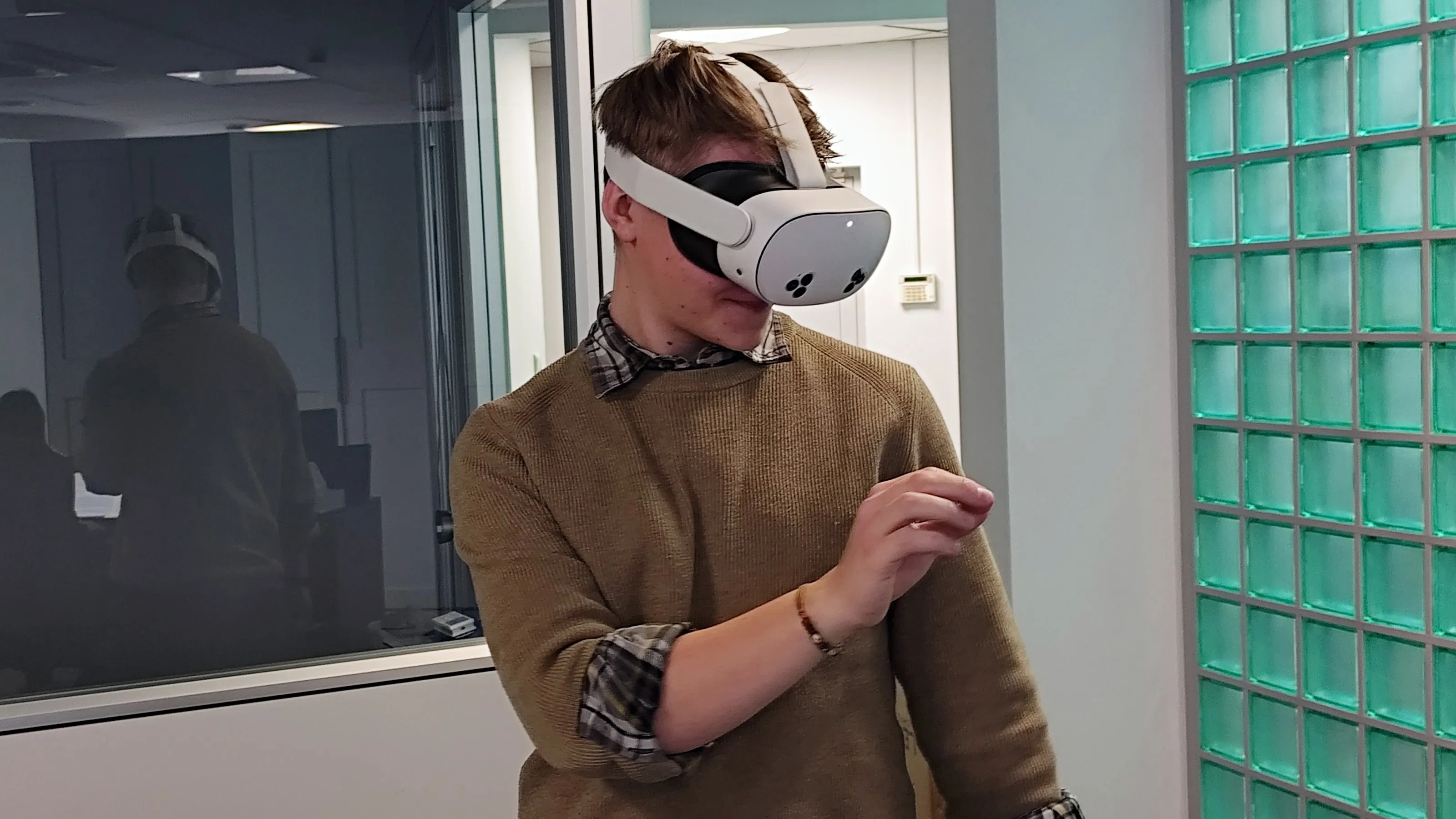 An employee undergoing health and safety training using VR technology